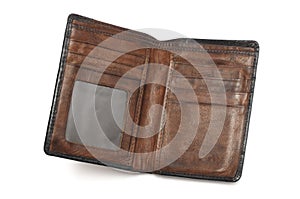 A pre-owned well used brown leather wallet