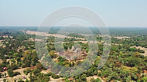 The Pre Rup in the city of Angkor in the green and arid countryside