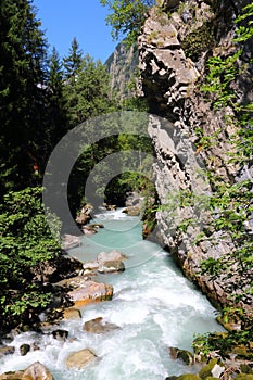 Pre` Saint Didier The Dora River of la Thuile` flows impetuously in the gorge of the Orrido. :Valle d`Aosta-Italy.