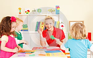 Pre-school children in the classroom with the teacher