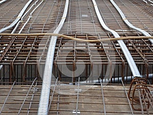 Pre-stress cable laid in round ducting and installed at the construction site.