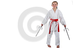 Tweenage girl going karate photo