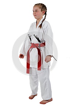 Tweenage girl going karate photo