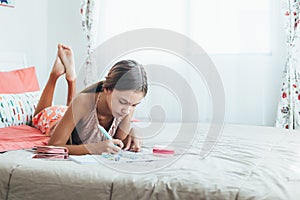 Pre teen girl doing school homework