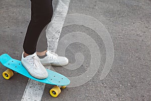 Pre teen skater on the city street