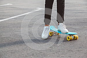 Pre teen skater on the city street