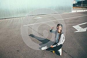 Pre teen skater on the city street