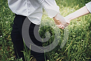 A pre-wedding of couple holding hands, love concept