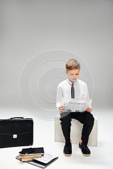 A preadolescent boy in  attire photo