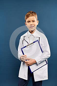 A preadolescent boy in a doctors photo