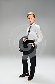  preadolescent boy in a white photo