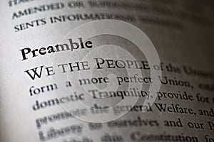 the Preamble, We the People of the United States, printed in textbook on white page. photo