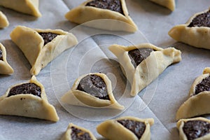 Prebaked `Haman pockets`, also known as Hamantashen, an Ashkenazi Jewish triangular filled-pocket cookies, usually associated with