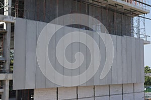 Precast concrete walls on building structures  Concrete wall panel  Building construction.