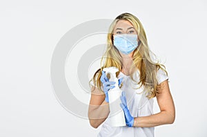 Precautions for coronavirus. covid-19 pandemic quarantine. disinfector or antiseptic. care your health. woman in