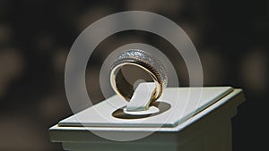 Precious diamond rings. Fine luxury diamond jewellery window display with ring pedant. Gold ring with brilliant isolated