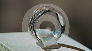 Precious diamond rings. Fine luxury diamond jewellery window display with ring pedant. Gold ring with brilliant isolated