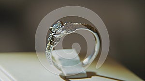 Precious diamond rings. Fine luxury diamond jewellery window display with ring pedant. Gold ring with brilliant isolated