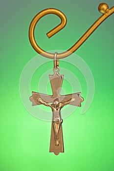 Gold Pendant on a green background photo