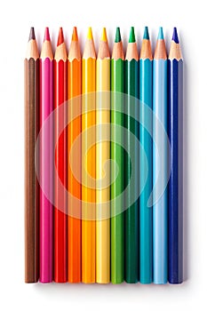 A vertical row of sharpened colored pencils in a vibrant rainbow spectrum on a white background