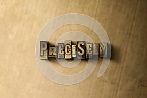 PRECISELY - close-up of grungy vintage typeset word on metal backdrop