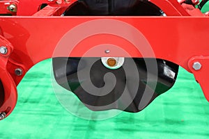 A row seeder. Seed drill.