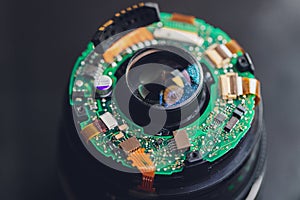 Precision prime optical dslr lens service, adjustment and alignment. Camera lens repair set in photo engineer workplace