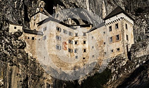 Predjama castle build into rock wall