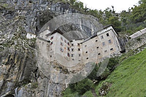 Predjama Castle in Postojna Cave, Slovenia photo