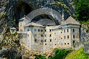 Predjama castle Slovenia the castle is a cave on a rock HDR