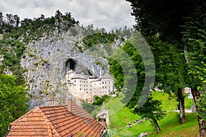 Predjama castle, Slovenia. Scenic view of Predjama castle near Postojna cave mouth. Anciend architecture builded in the rock. Old