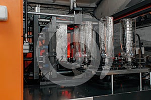 The preform shape of PET bottle in the blowing mold machine. The operation of PET bottle processing by blowing process