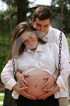 Preg couple outside down