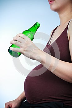 Pregnancy with alcohol. Pregnant female unhealthy motherhood con