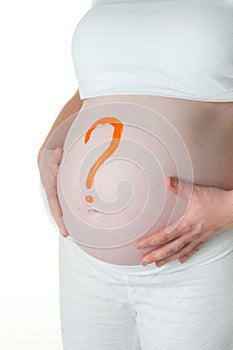 Pregnancy belly with a painted question mark