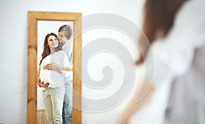 Pregnancy. happy family future parents pregnant mother and fathe