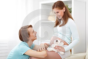 pregnancy. happy family future parents pregnant mother and father