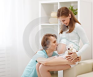 pregnancy. happy family future parents pregnant mother and father