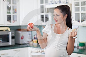 Pregnancy and a healthy food.