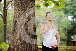 Pregnancy and motherhood-pregnant woman doing yoga