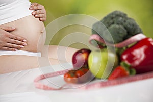 Pregnancy, sport, fitness, healthy lifestyle concept