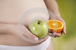 Pregnancy, sport, fitness, healthy lifestyle concept