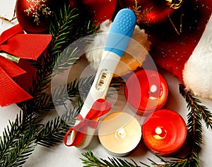 pregnancy test positive result merry christmas present red ribbon