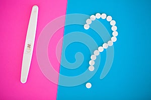 Pregnancy test. The result is positive with two strips and condo