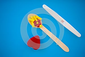 Pregnancy test. The result is positive with two strips. Treatment of infertility with pills, help in conceiving a child