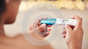 Pregnancy test, woman and hands check results of medical information at home. Closeup, fertility stick or family