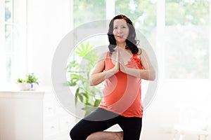 Pregnancy yoga. Exercise for pregnant woman