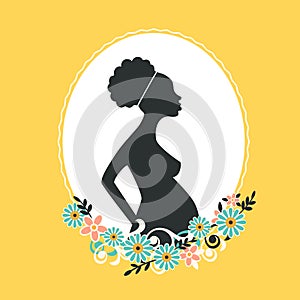 Pregnant african woman vector silhouettte in spring flower background