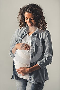 Pregnant Afro American girl