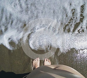 Pregnant at the beach